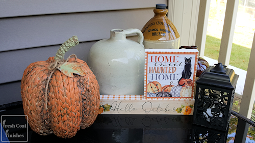 Painted rattan pumpkin with other Autumn decor